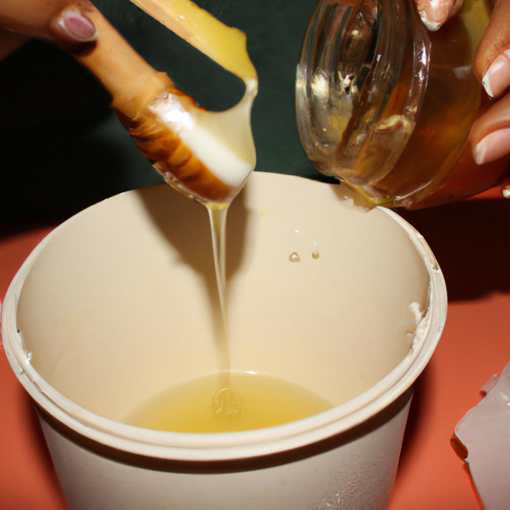Person making honey face mask