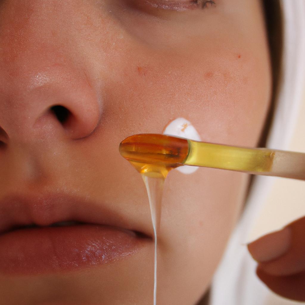 Person applying honey on face